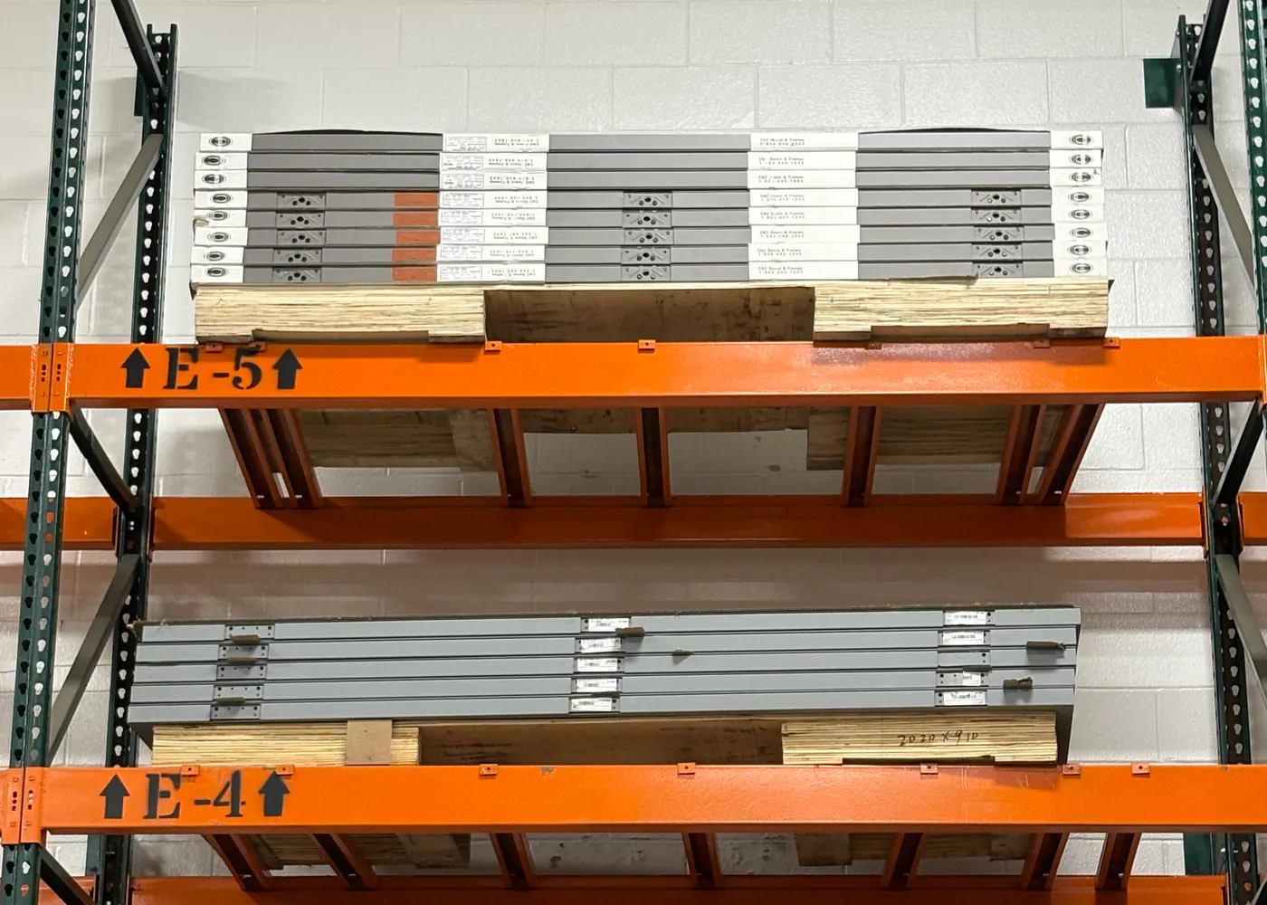 Commercial hollow metal doors organized on warehouse racks