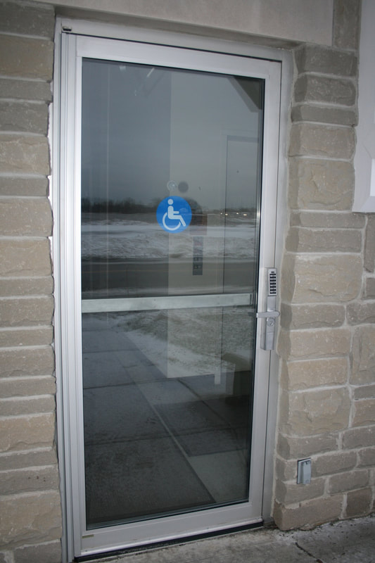 Glazed clear anodized entrance door with aluminum framing - Huron, OH