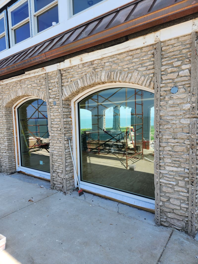Arched glass windows installed in a stone wall - Kelleys Island, OH