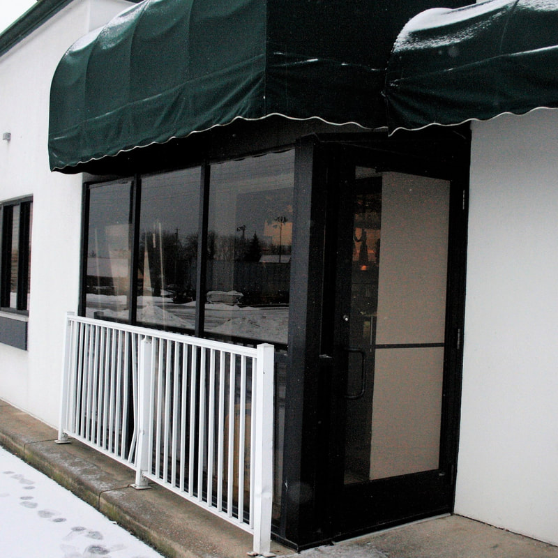 Dark bronze storefront system - Port Clinton, OH