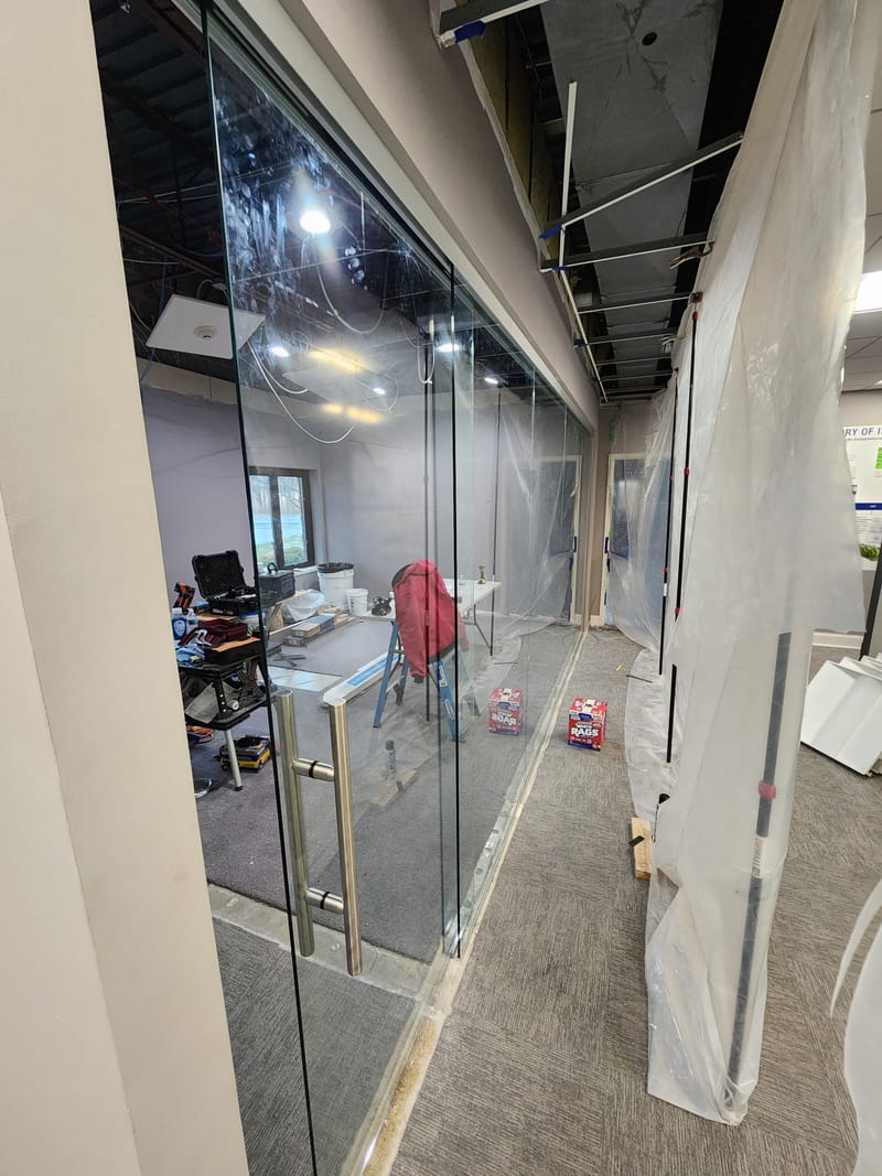 Interior glass partition and door with a vertical pull handle - Avon, OH