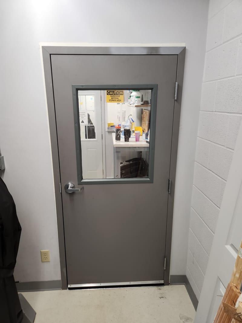 Interior hollow metal door with a half glass lite and lever handle - Sandusky, OH