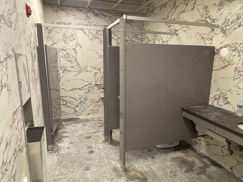 Commercial toilet partitions with overhead bracing in a tiled restroom - Stow, OH