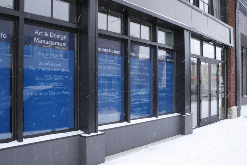Commercial storefront windows along a brick facade - Columbus, OH