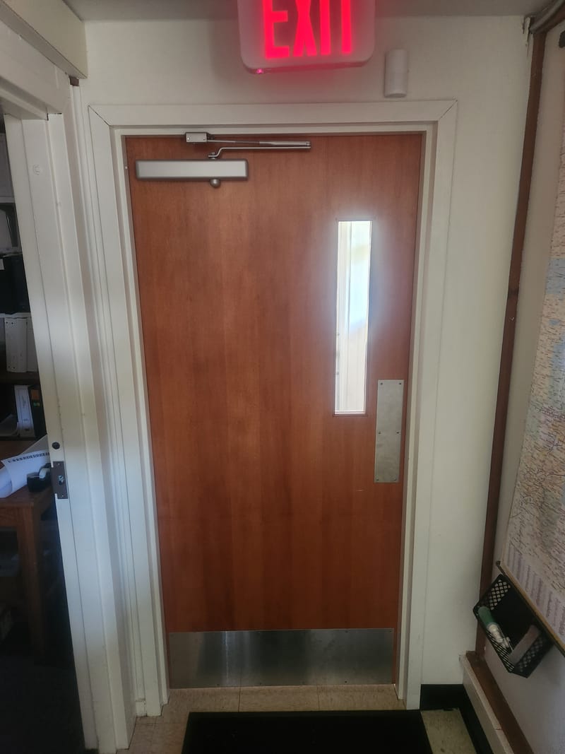 Wood door with a narrow lite, closer, push plate, and kick plate - Port Clinton, OH